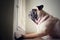 A cute pug dog puppy is sit and waiting owner bring to play outside at the door