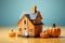 Cute pumpkin shaped house on orange background