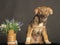 Cute Puppy next to a vase