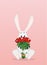 Cute rabbit with a bouquet of red roses. A hare with flowers.
