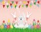 Cute rabbit with easter bunnies on a stick with red bows. The hare sits