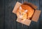 Cute red cat in a cardboard box.