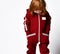 Cute red-haired girl in a comfortable tracksuit