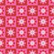 Cute retro groovy flowers on red and pink chessboard seamless pattern .