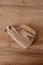 A cute rustic wooden toy in the kitchen. Kitchenware.