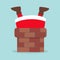 Cute Santa Claus in red clothes stuck in chimney.