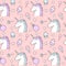 Cute seamless pattern background illustration with unicorn, candy, lollipop, ice cream, stars and cupcake