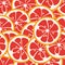 Cute seamless pattern with red grapefruit slices