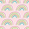 Cute seamless pattern with repeating rainbow. Drawn by hand.