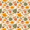 Cute seamless pattern with teapots, coffee cups, autumn leaves, books, candles