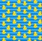Cute seamless pattern with yellow rubber duck on blue background.