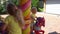 Cute sister and brother sitting on playground carousel. Gimbal motion