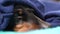 Cute Sleepy Dachshund Resting Under the Blanket