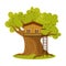 Cute small treehouse with two windows and stairs. Vector illustration in flat cartoon style