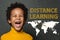 Cute smart African American child boy. Advance distance learning