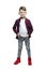 Cute smiling boy 5-6 years old in jeans, a white T-shirt and a red plaid shirt. Optimism and positivity. Full height. Isolated on