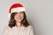 Cute smiling Christmas woman Santa on white background, Xmas portrait