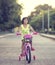 Cute smiling little girl with bicycle