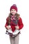 Cute smiling little girl with curly hairstyle wearing knitted sweater, scarf, hat and gloves with skates isolated on white