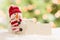 Cute Snowman with Blank White Card Over Abstract Background