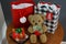 Cute, soft toy bear with colorful Xmas packages