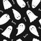 cute spooky ghost pattern on black background