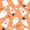 cute spooky ghost pattern on orange background