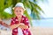 Cute stylish boy on the beach