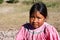Cute Tarahumara girl wearing traditional bright outfit in Coppe