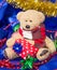 Cute teddy bear with Christmas decorations