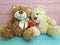 Cute teddy bear toy with red heart romantic on colored wooden