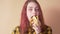 Cute teen girl eating banana