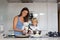 Cute toddler child and mom, mother and blond boy, making pancake in kitchen