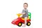 Cute toddler riding in a baby car