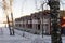 Cute townhouses near the river during sunny winter day