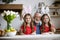 Cute twins celebrating Easter with granddad stock photo