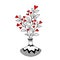 Cute vase with decorative leaves and hearts
