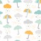 Cute vector pattern with umbrellas, clouds and rain drops. Scandinavian style seamless background.