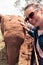 Cute woman pets a baby elephant in Nairobi Kenya Africa