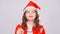 Cute Woman wearing Santa Claus hat and glasses