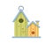 Cute wooden birdhouses or bird feeder with holes. Colorful bird house, place for nest with slope roof made of wood