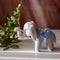 Cute woolly toy elephant, felting wool