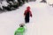 Cute year-old girl playing in the snow