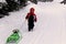 Cute year-old girl playing in the snow