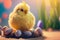 Cute yellow chicken sits on a nest, painted eggs lie around, against the backdrop of a garden. Easter holiday concept