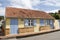 Cute yellow home on Allee des Arlesiens in Les Anses d`Arlet village, Grand Anse, Martinique