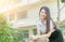 Cute young asian woman in uniform student smile in campus