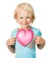 Cute young boy holding love heart