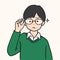 Cute young boy lifted glasses up, hand drawn style vector illustration