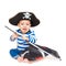 Cute young child dressed as pirate over white